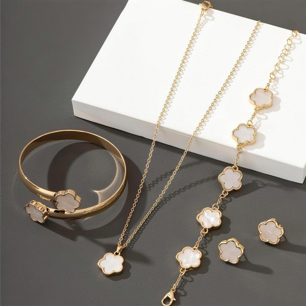 Lucky Clover Jewels 4-Piece Set in White, gold clover necklace, bracelet, bangle and stud earrings