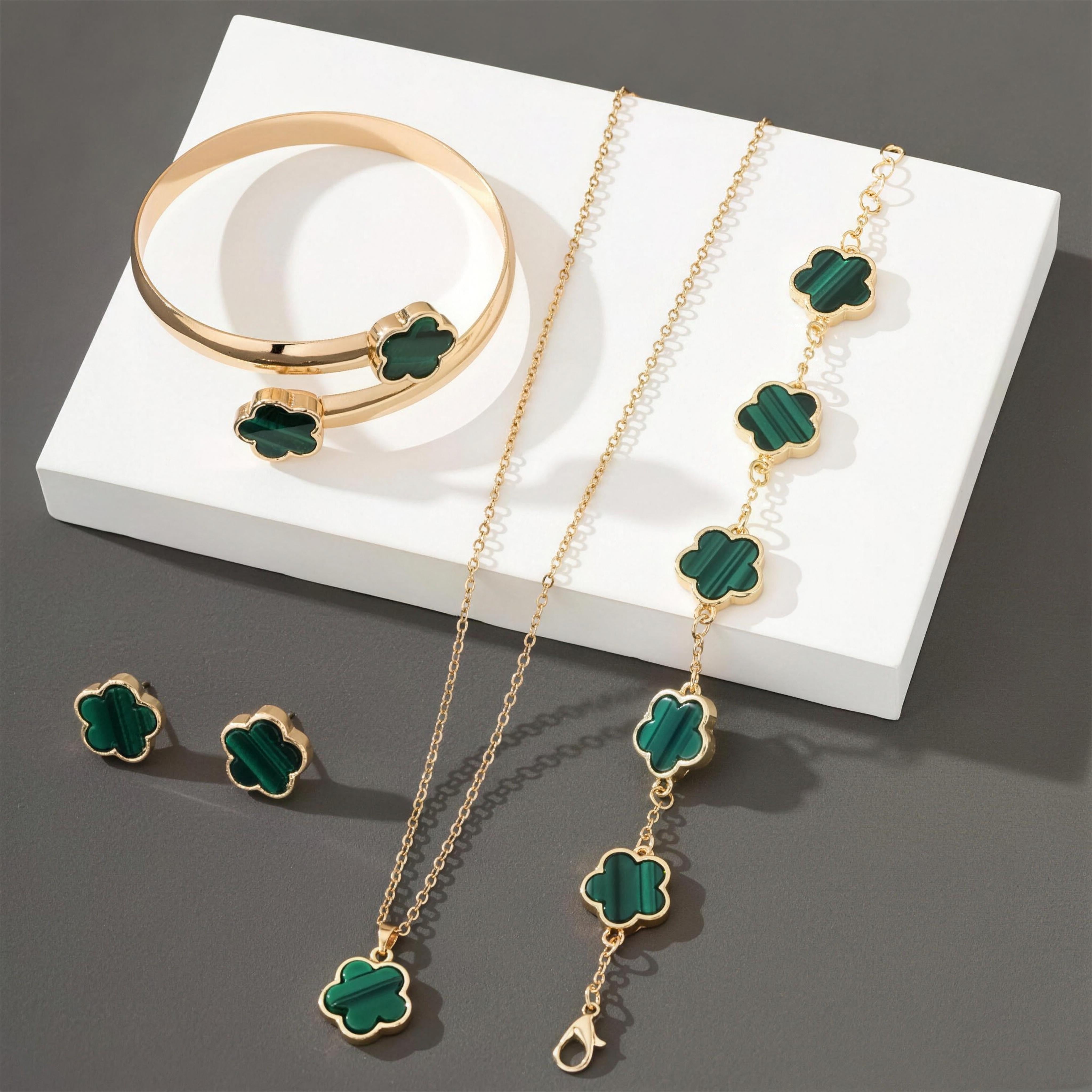 Lucky Clover Jewels 4-Piece Set in Green, gold clover necklace, bracelet, bangle and stud earrings